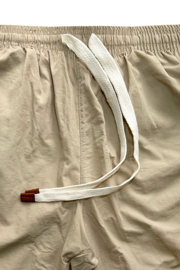 DRAWSTRING OF THE BEIGE RHUYS SWIM TRUNKS