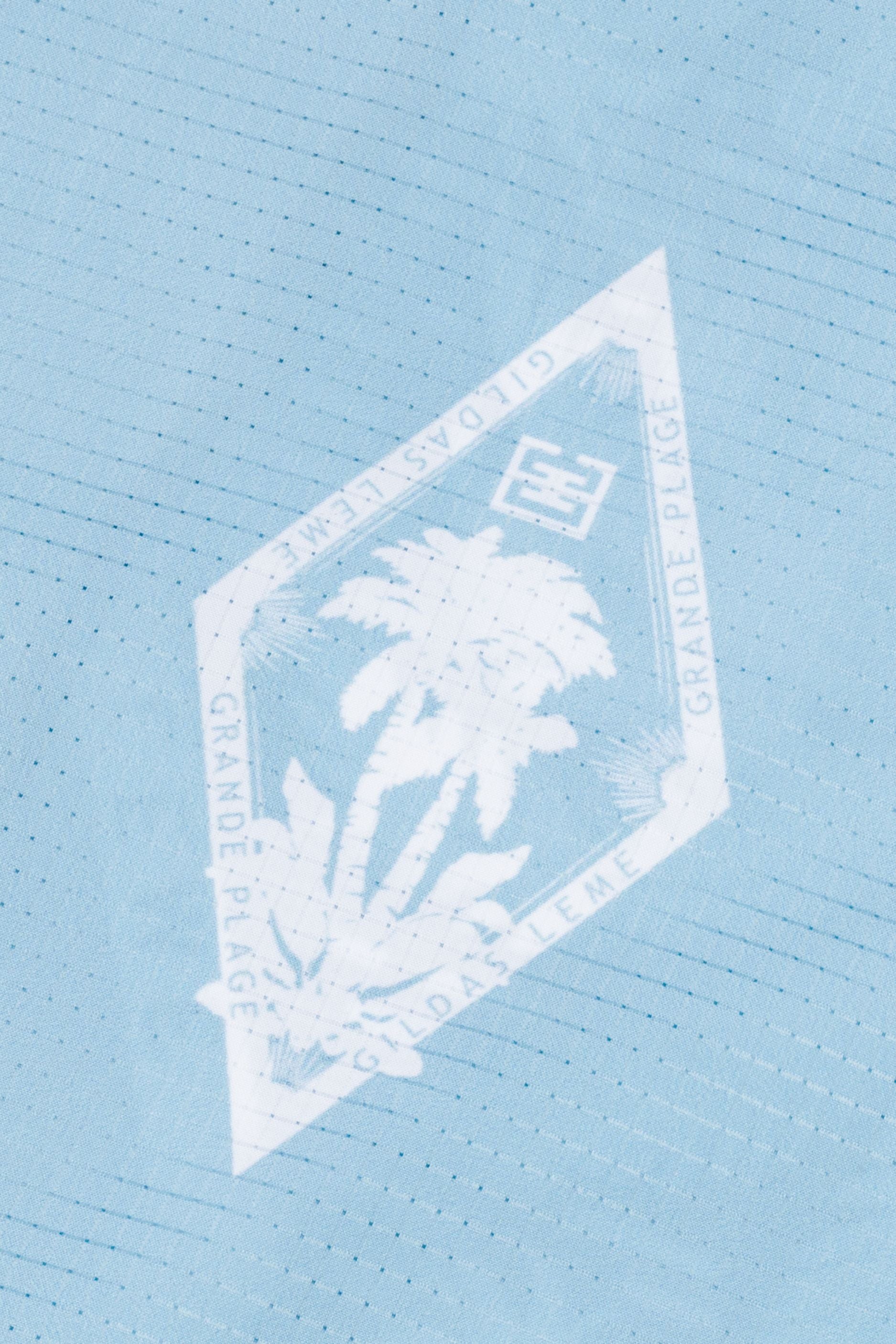 Logo on the front chest of the paradise shirt light blue