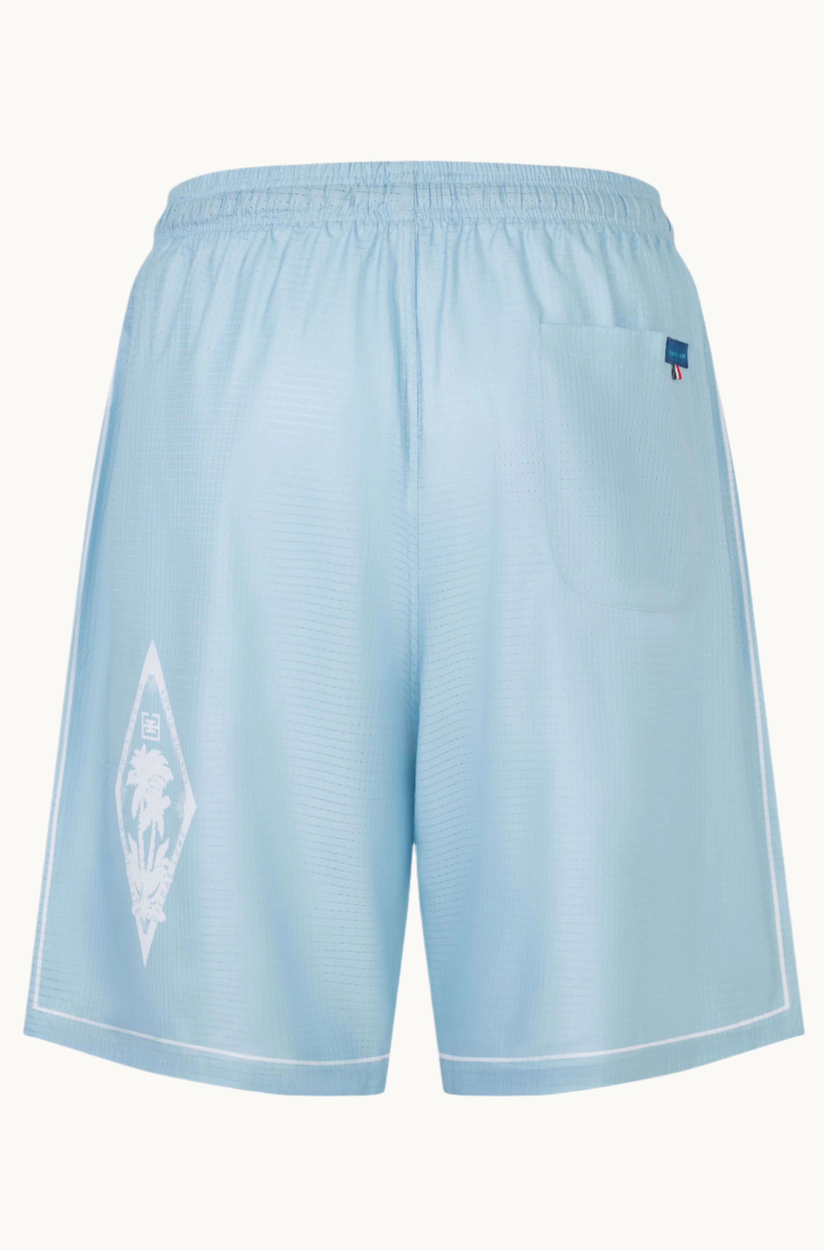 Back label of Pink Paradise resort shorts