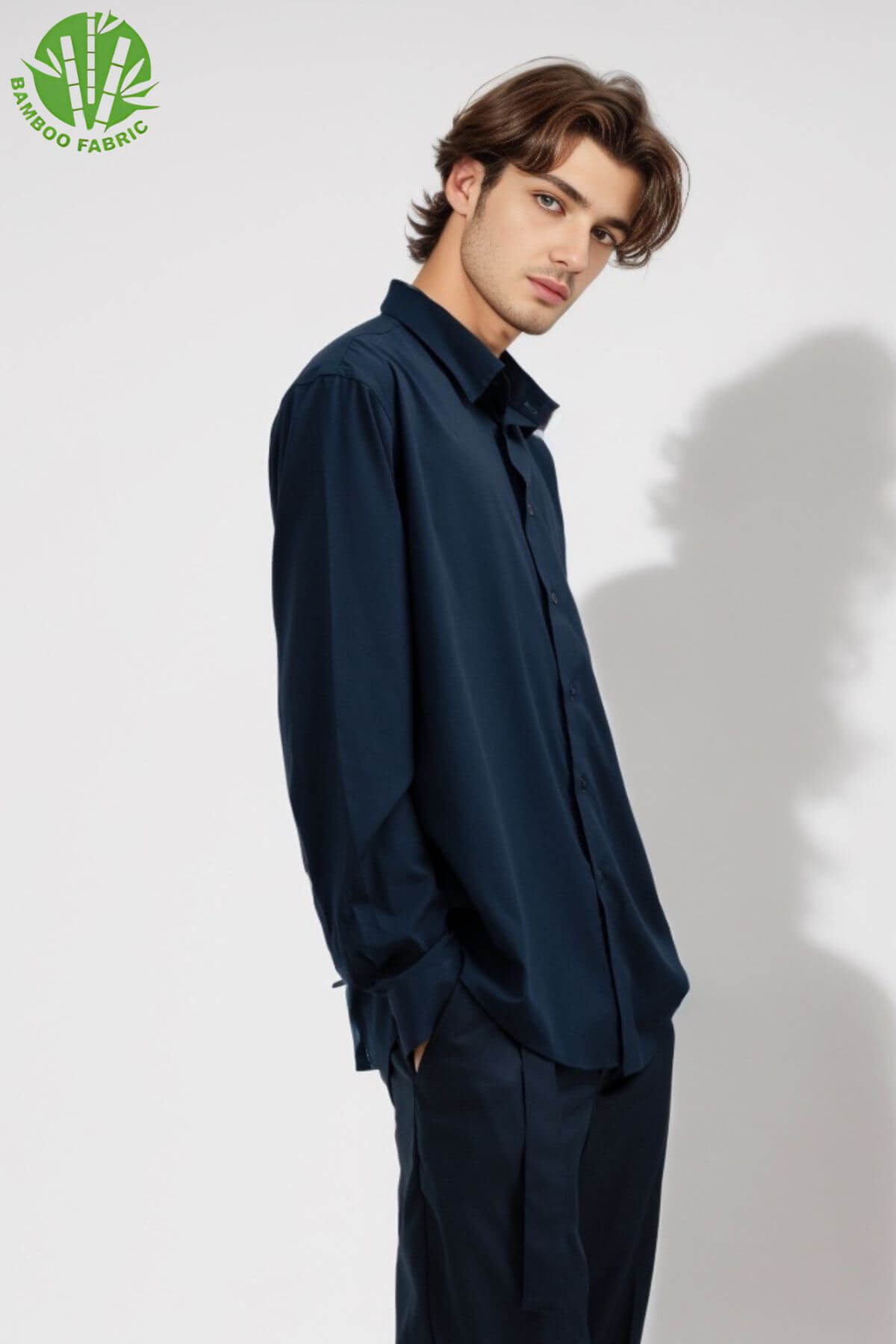 Back view of men’s navy bamboo Riviera long sleeve shirt – relaxed silhouette with breathable, sustainable fabric