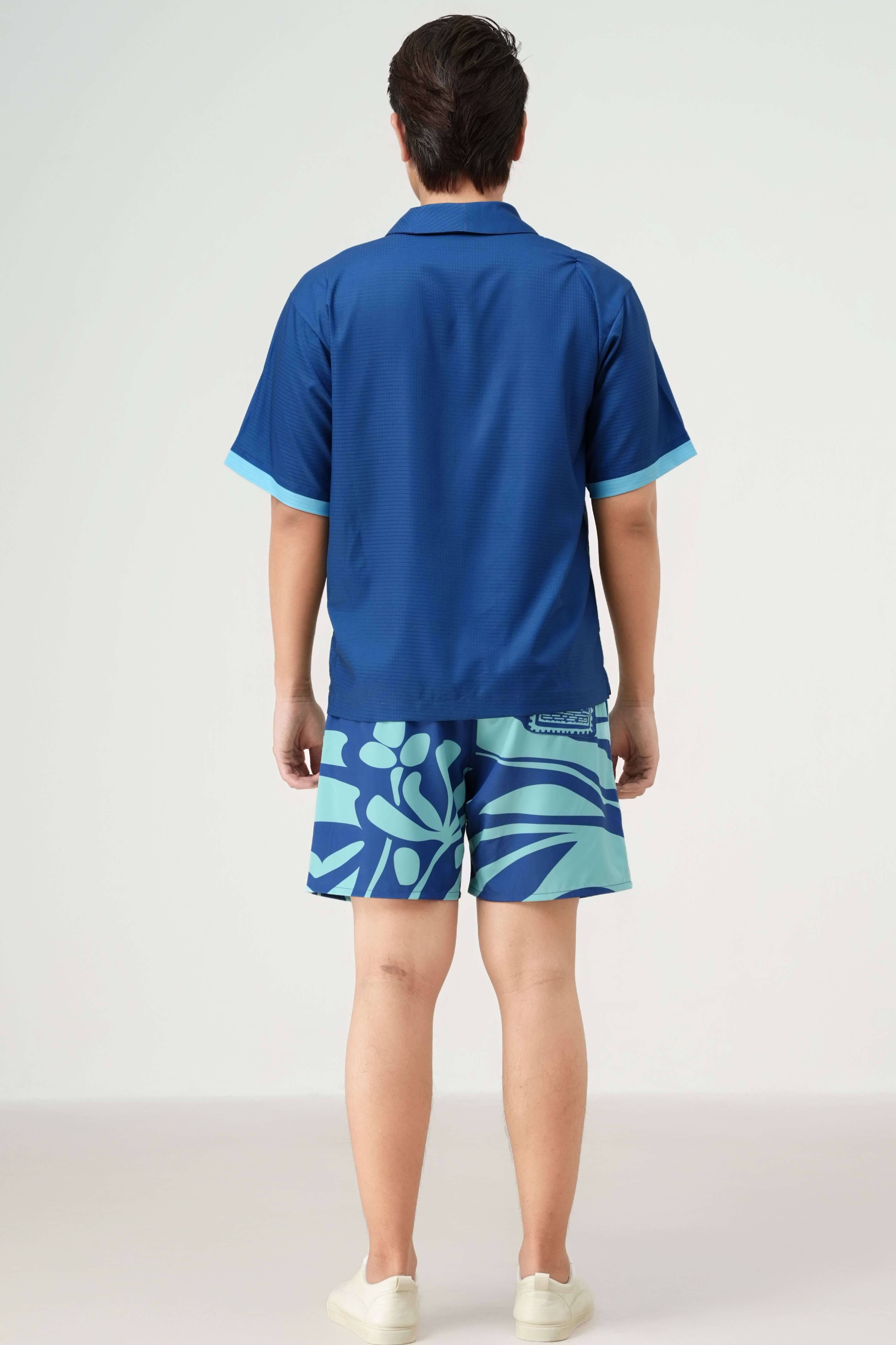 Back label of Blue Stamp men’s resort set in navy blue