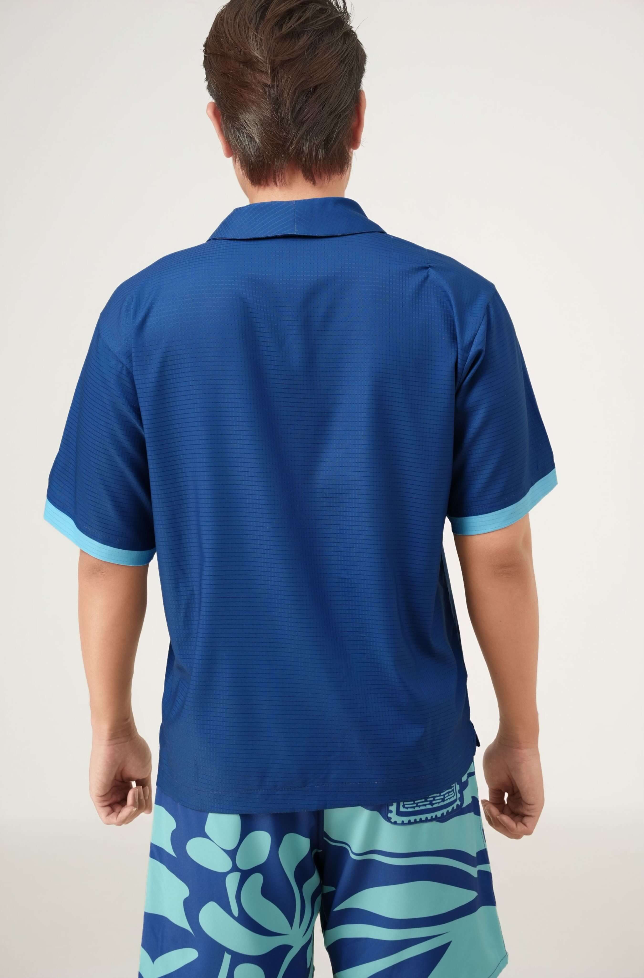 Back label detail of Blue Stamp men’s resort shirt in navy blue