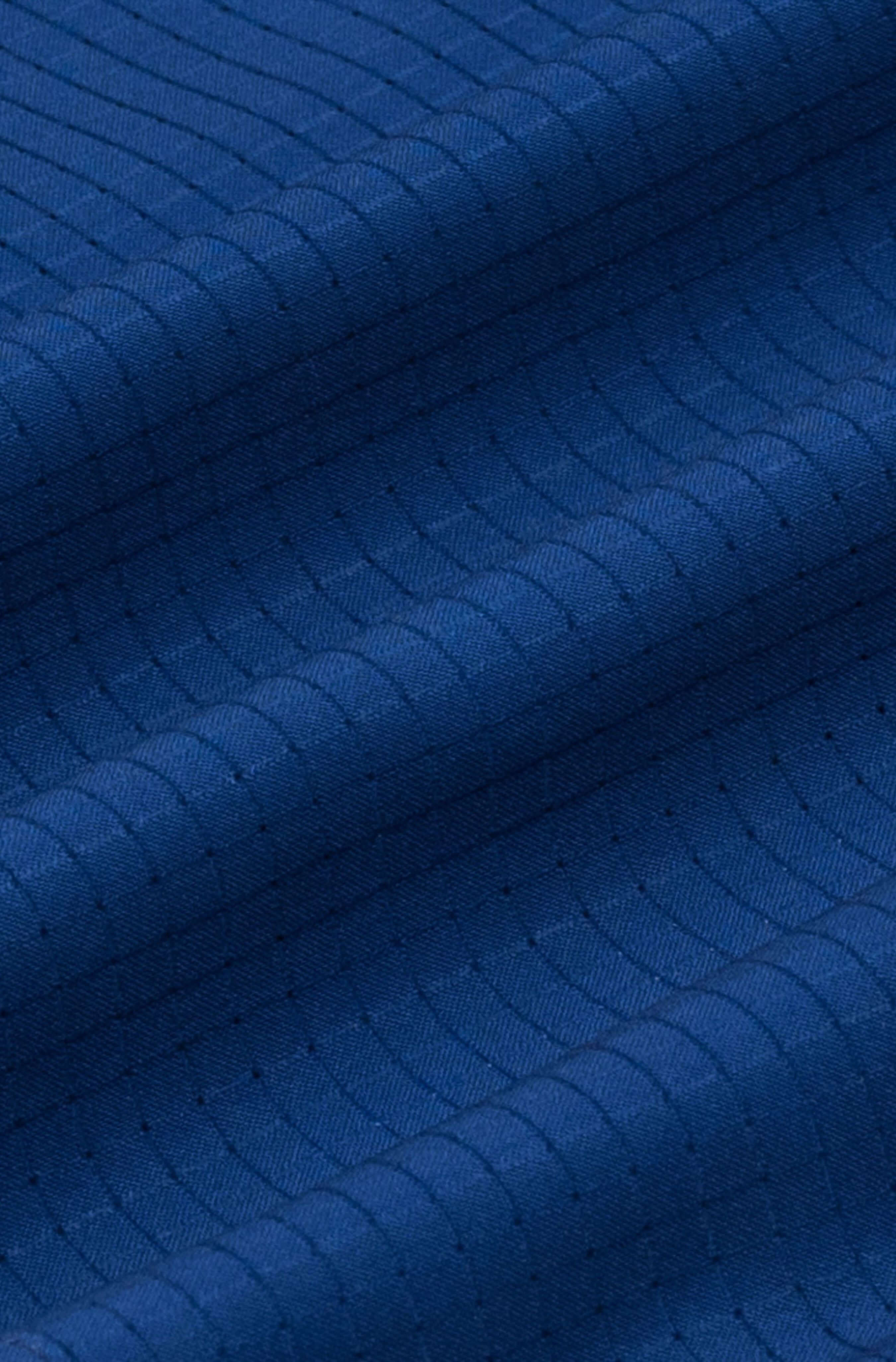 Fabric detail of Blue Stamp men’s resort shirt in navy blue