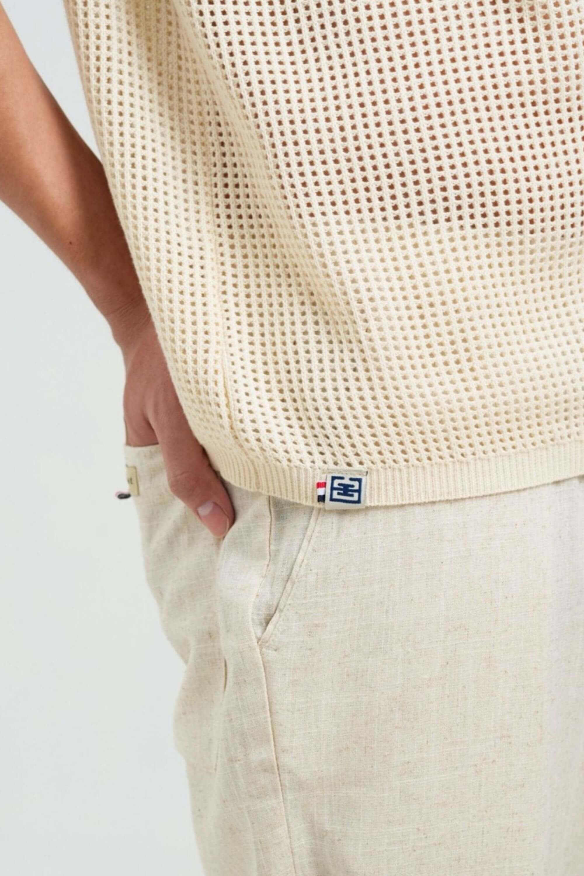 coast knit polo shirt beige tag logo view on model