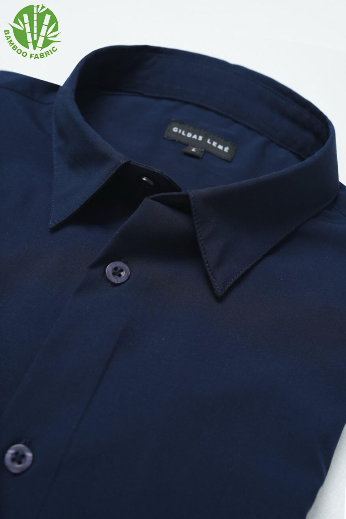 Close-up of the collar on men’s navy bamboo Riviera long sleeve shirt – soft structure, breathable fabric, and elegant neckline