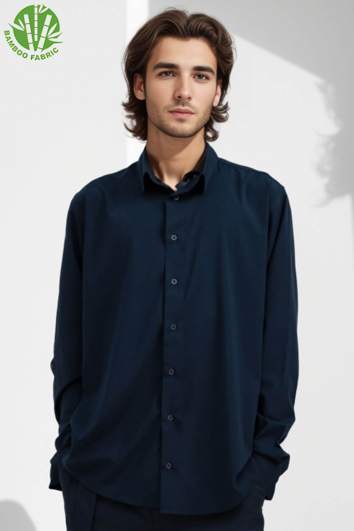 Front detail of men’s navy blue bamboo Riviera long sleeve shirt – sustainable fabric with elegant neckline and relaxed tailoring