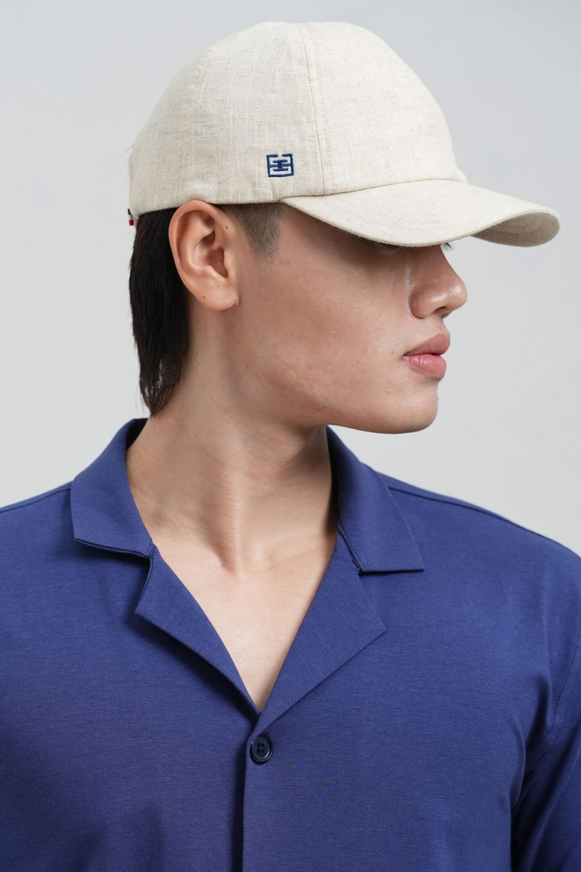 linen basketball cap front view on model