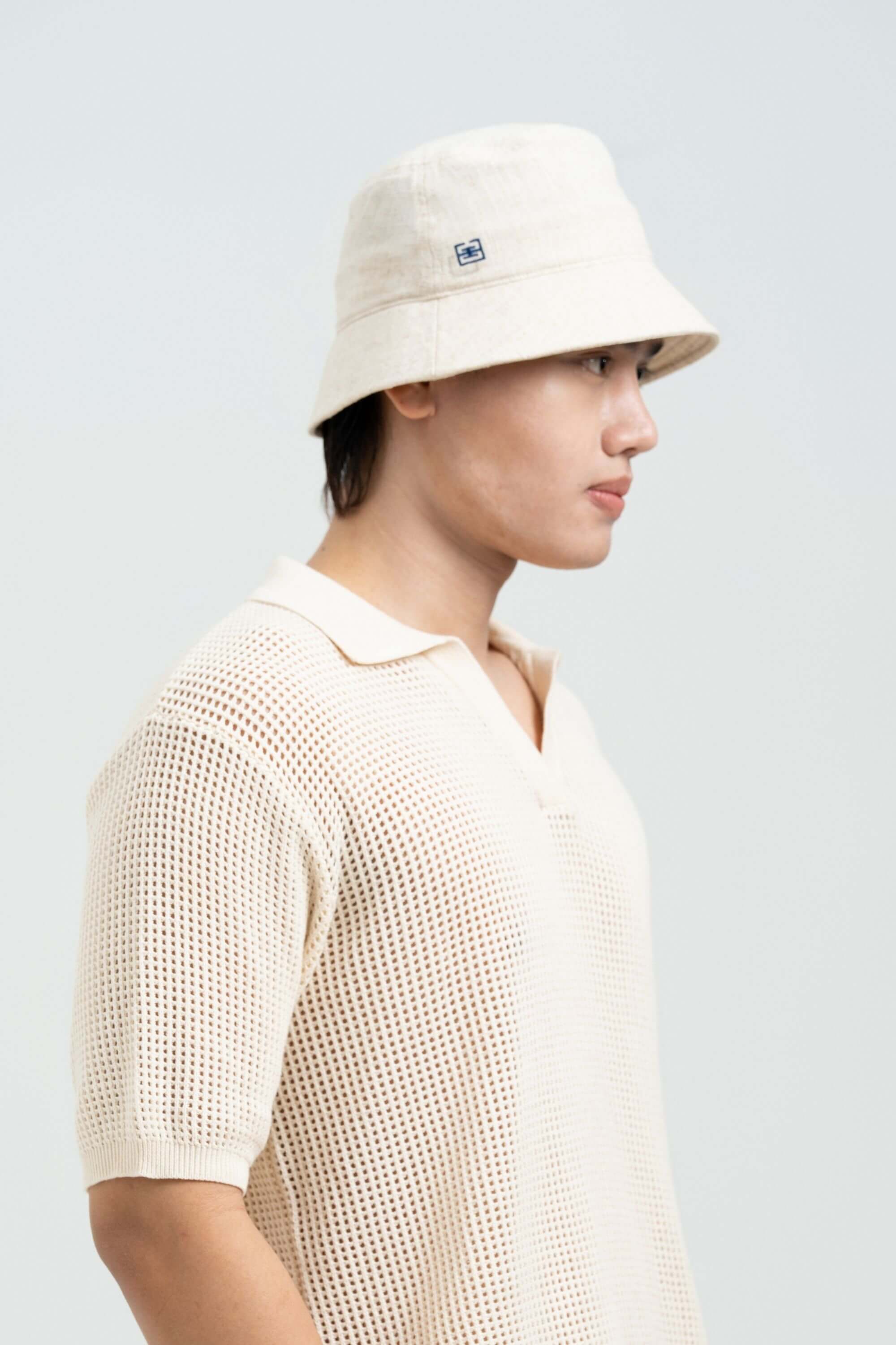 linen bucket hat front view on model