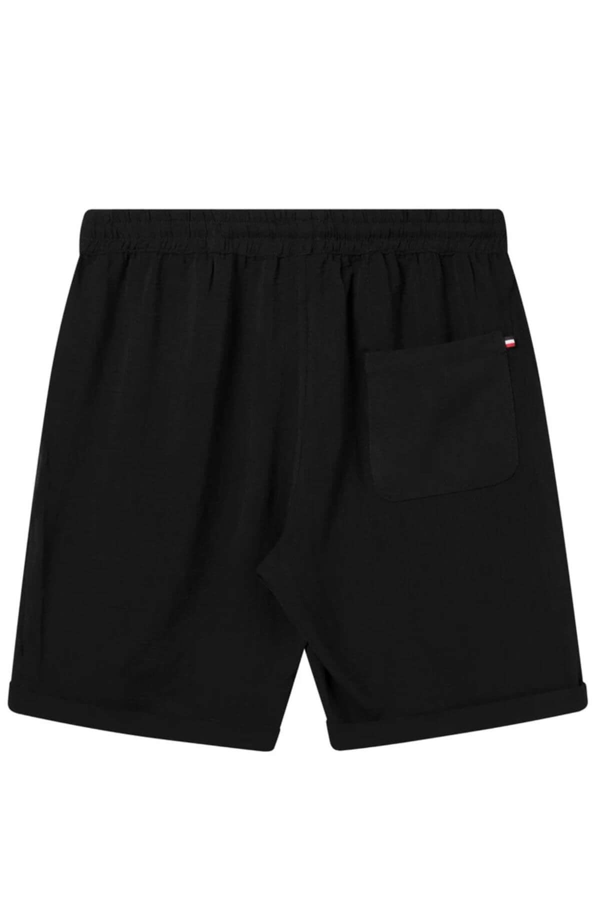 Back view of men’s black summer resort shorts