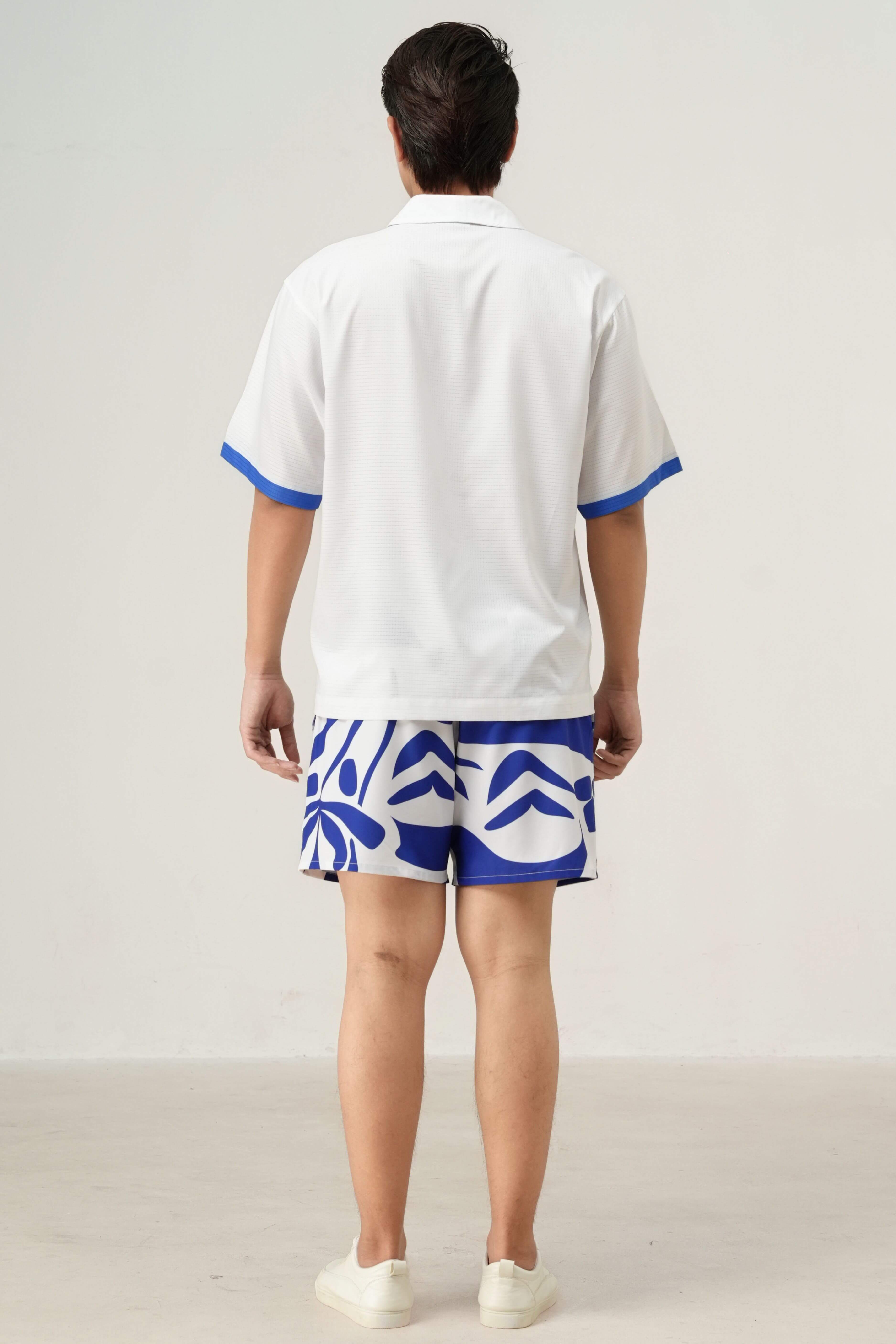 Back view of men’s Blue Stamp summer resort wear set