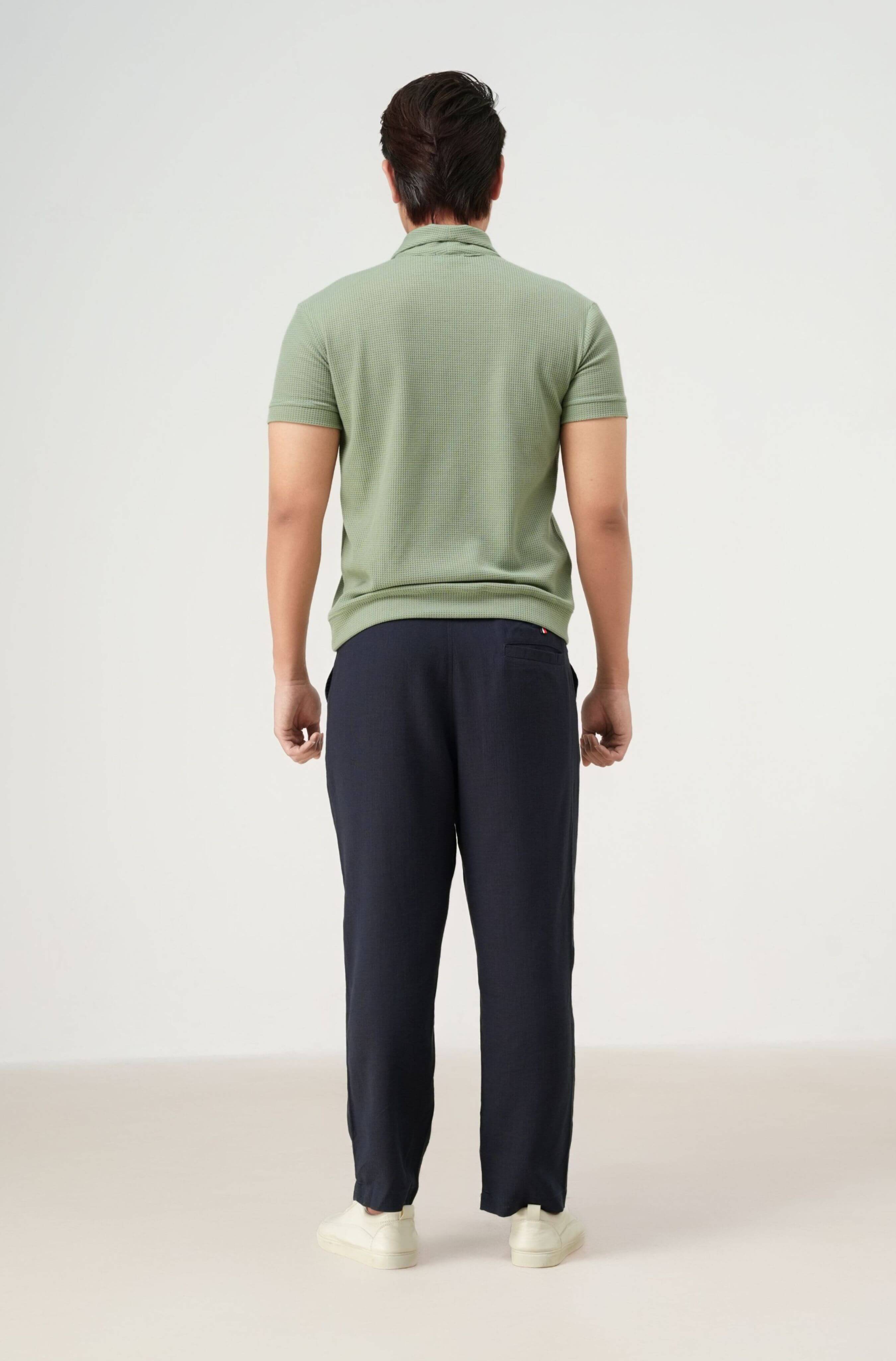Back label of men’s resort set with polo shirt and linen pants
