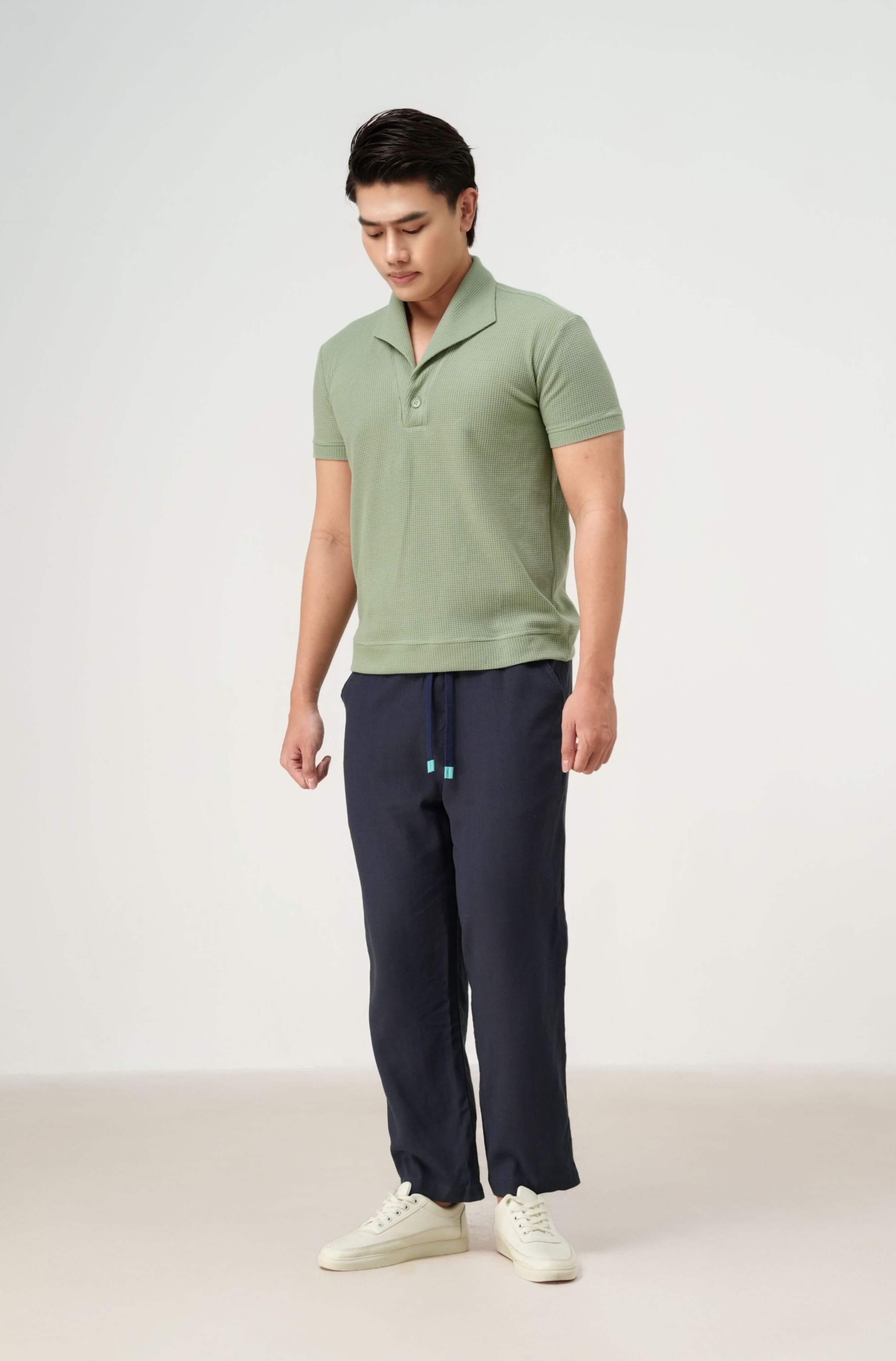 Front label of men’s resort set with polo shirt and linen pants