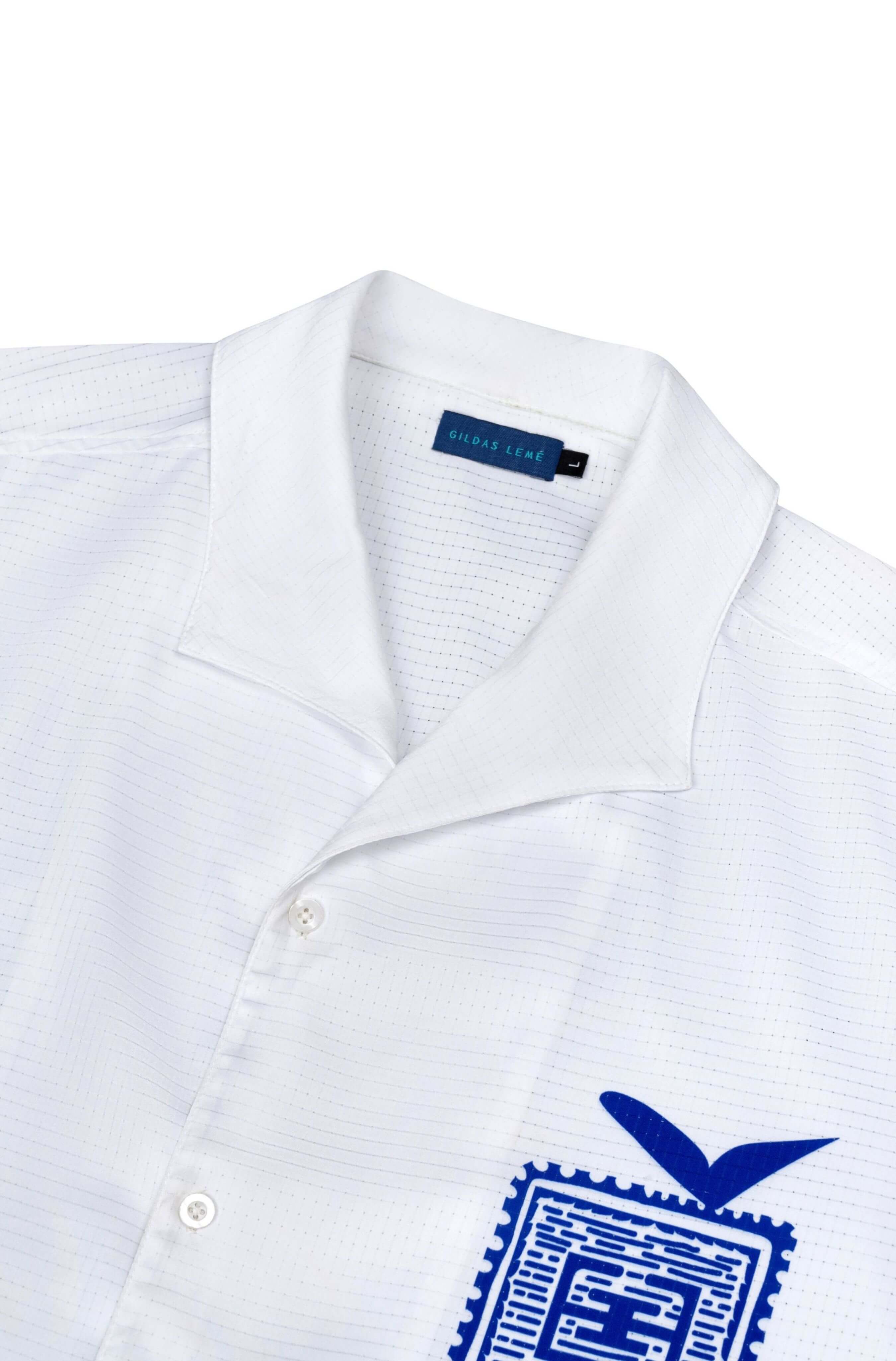 Collar detail of men’s white Blue Stamp beach shirt