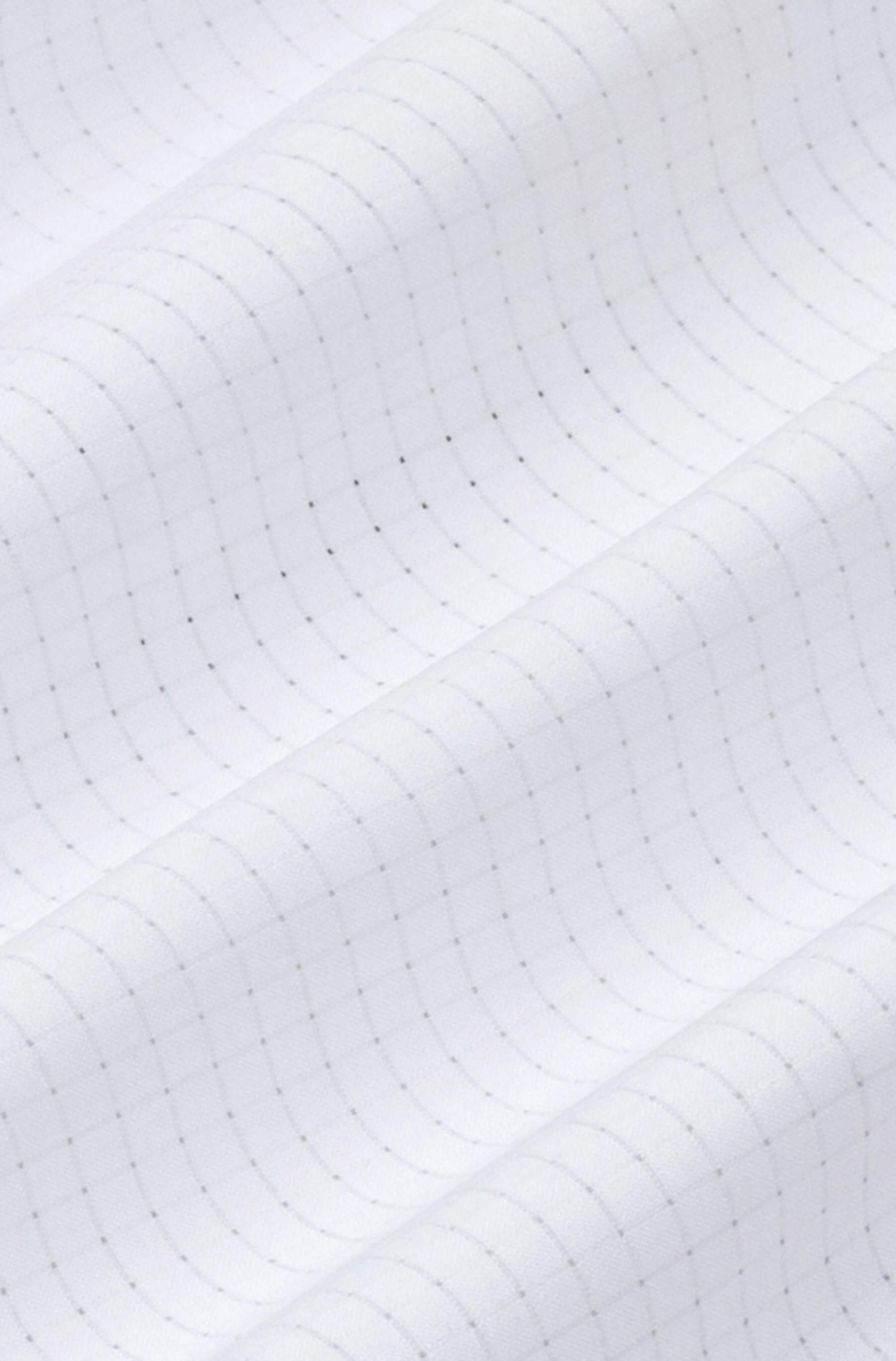 Fabric detail of men’s white Blue Stamp resort shirt
