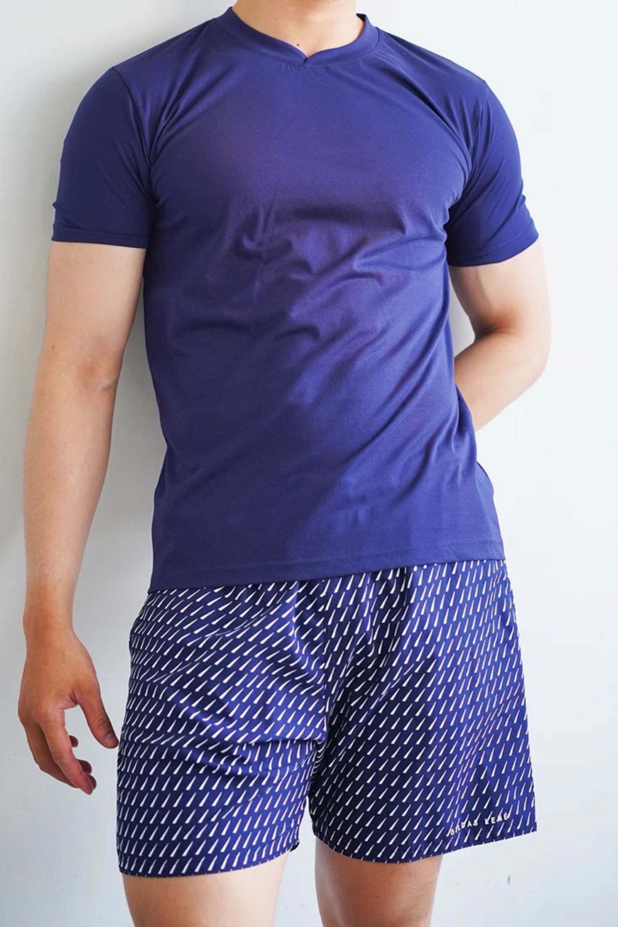 accent swim short model wearing the and qmax #color_navy