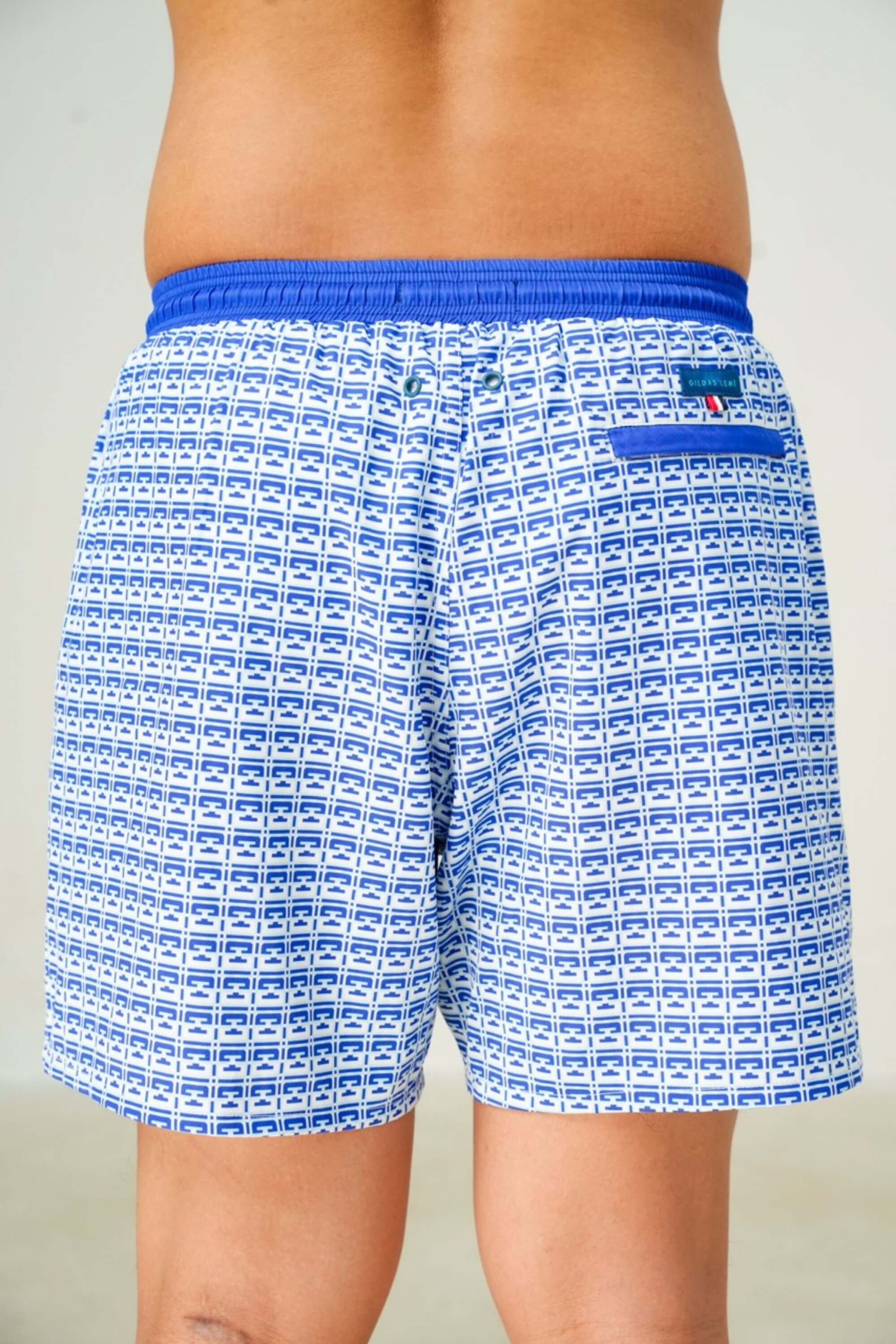 monogram edition swim trunk back view on model #color_pool blue