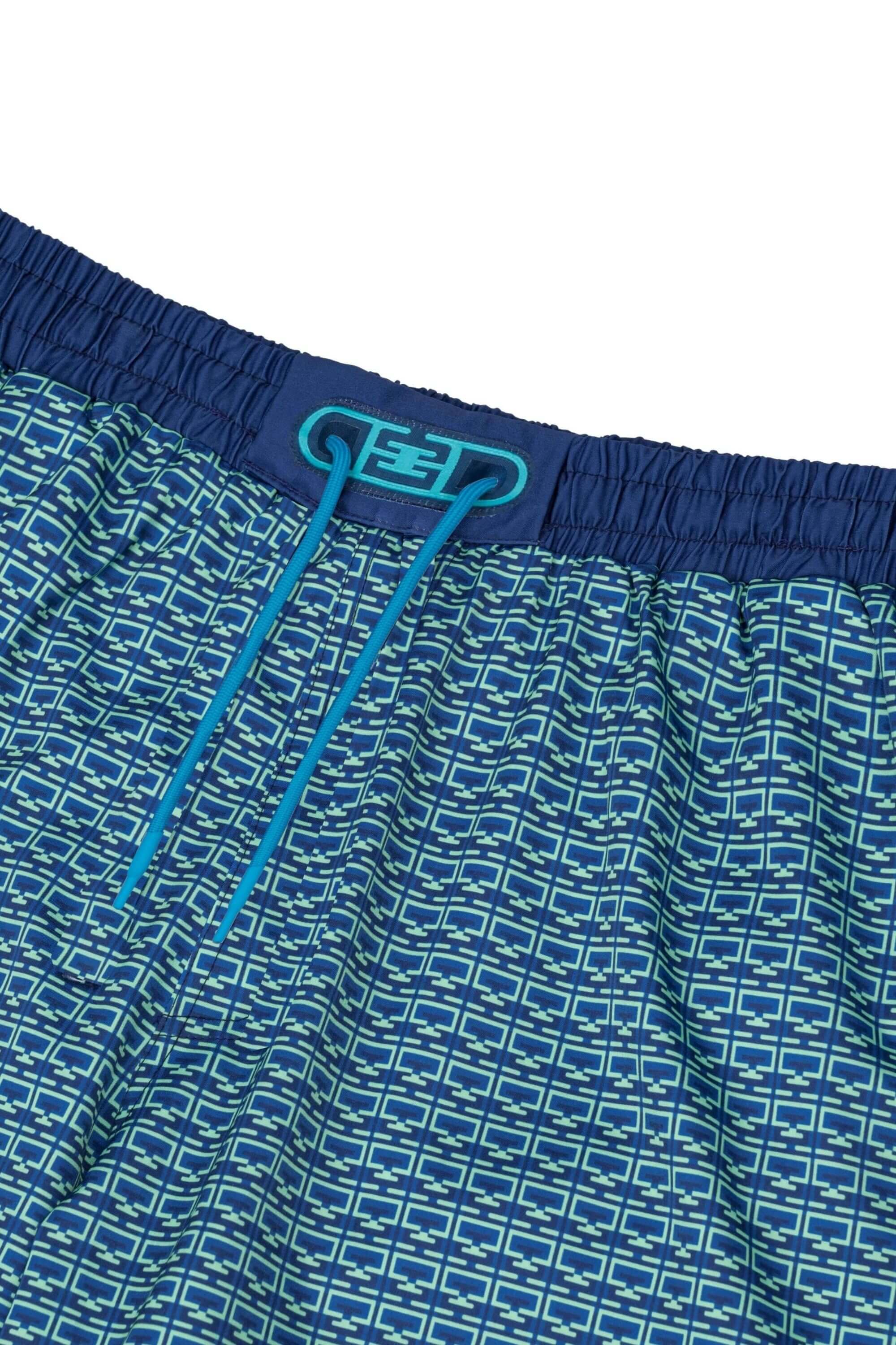 monogram edition swim trunk ocean green with elastic waistband and drawstring #color_ocean green