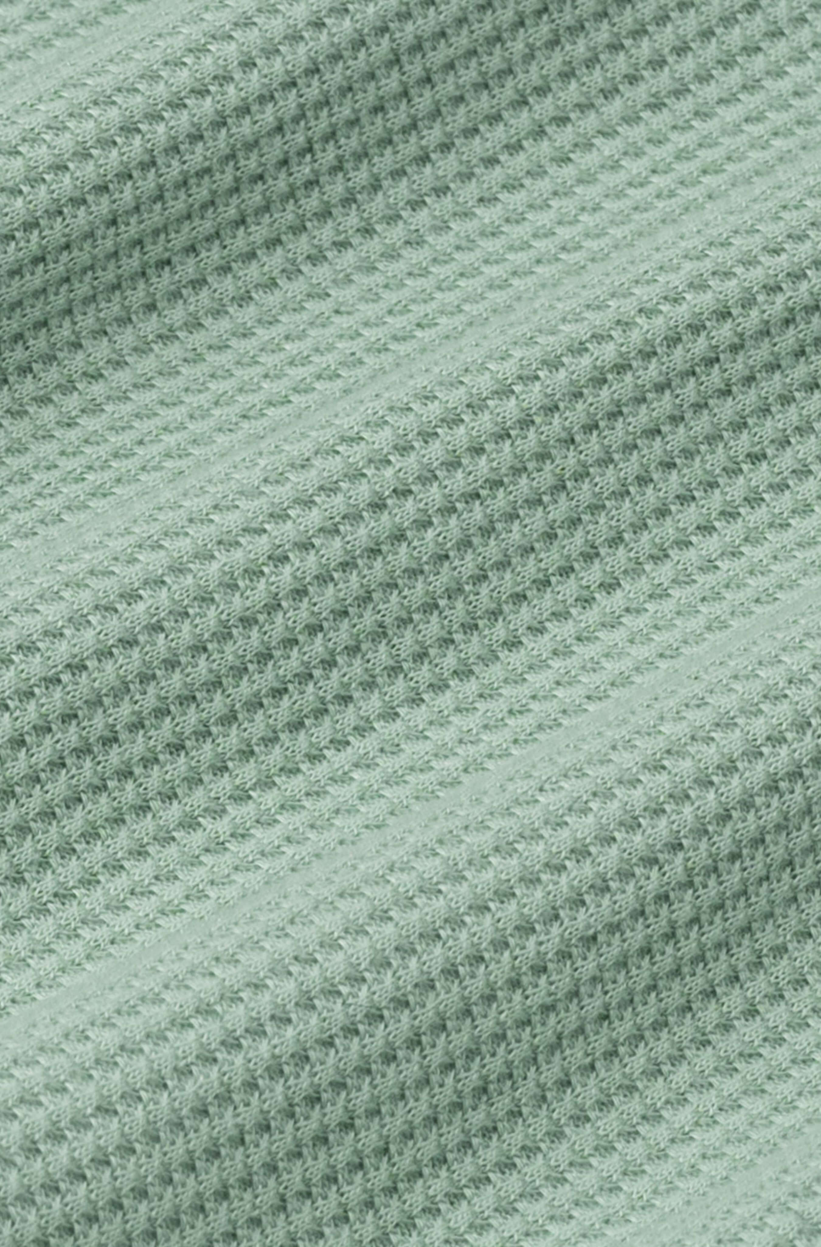 Fabric detail of Palma men’s polo shirt in mint green