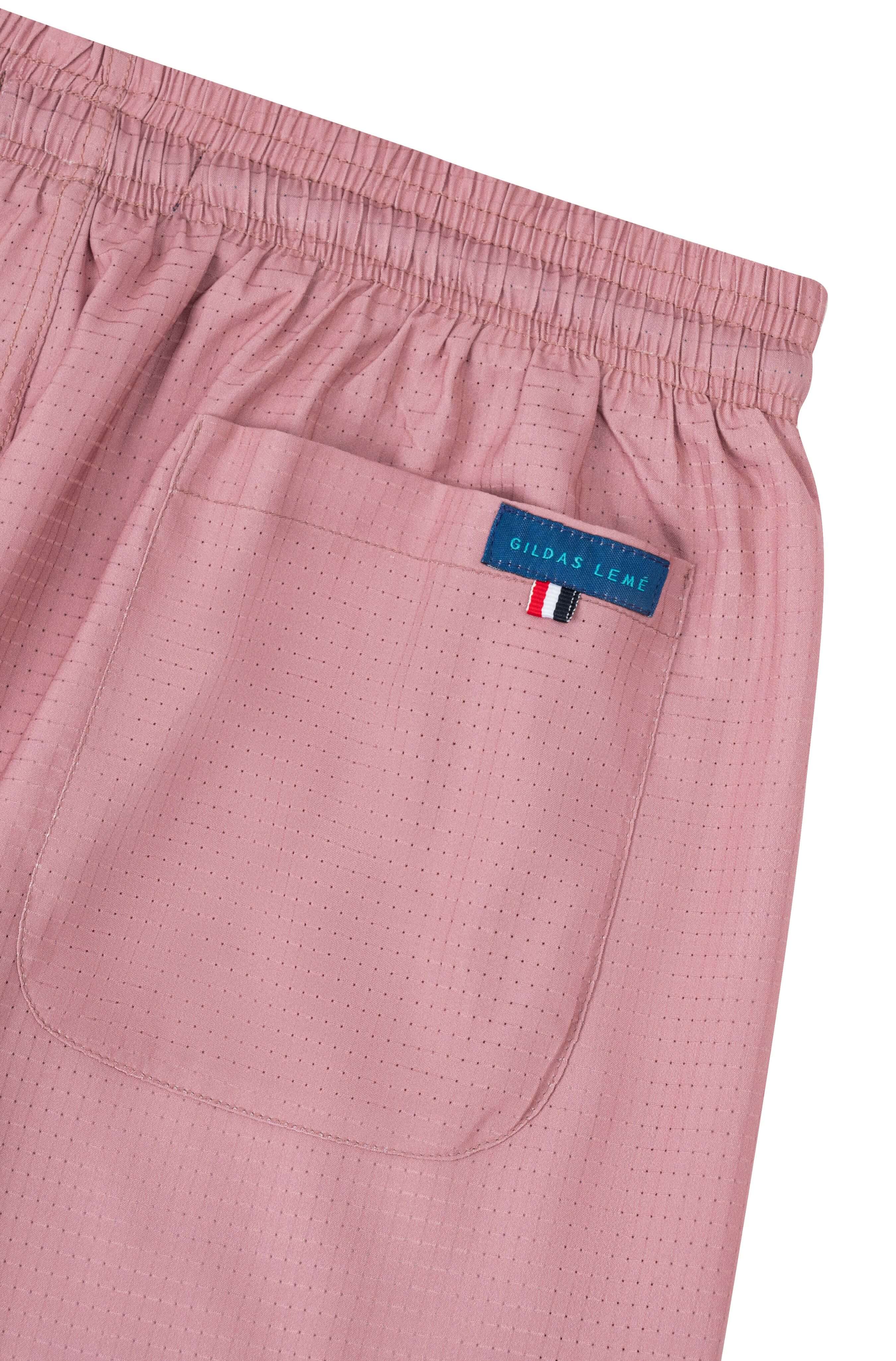 Back pocket detail of Pink Paradise summer beach shorts