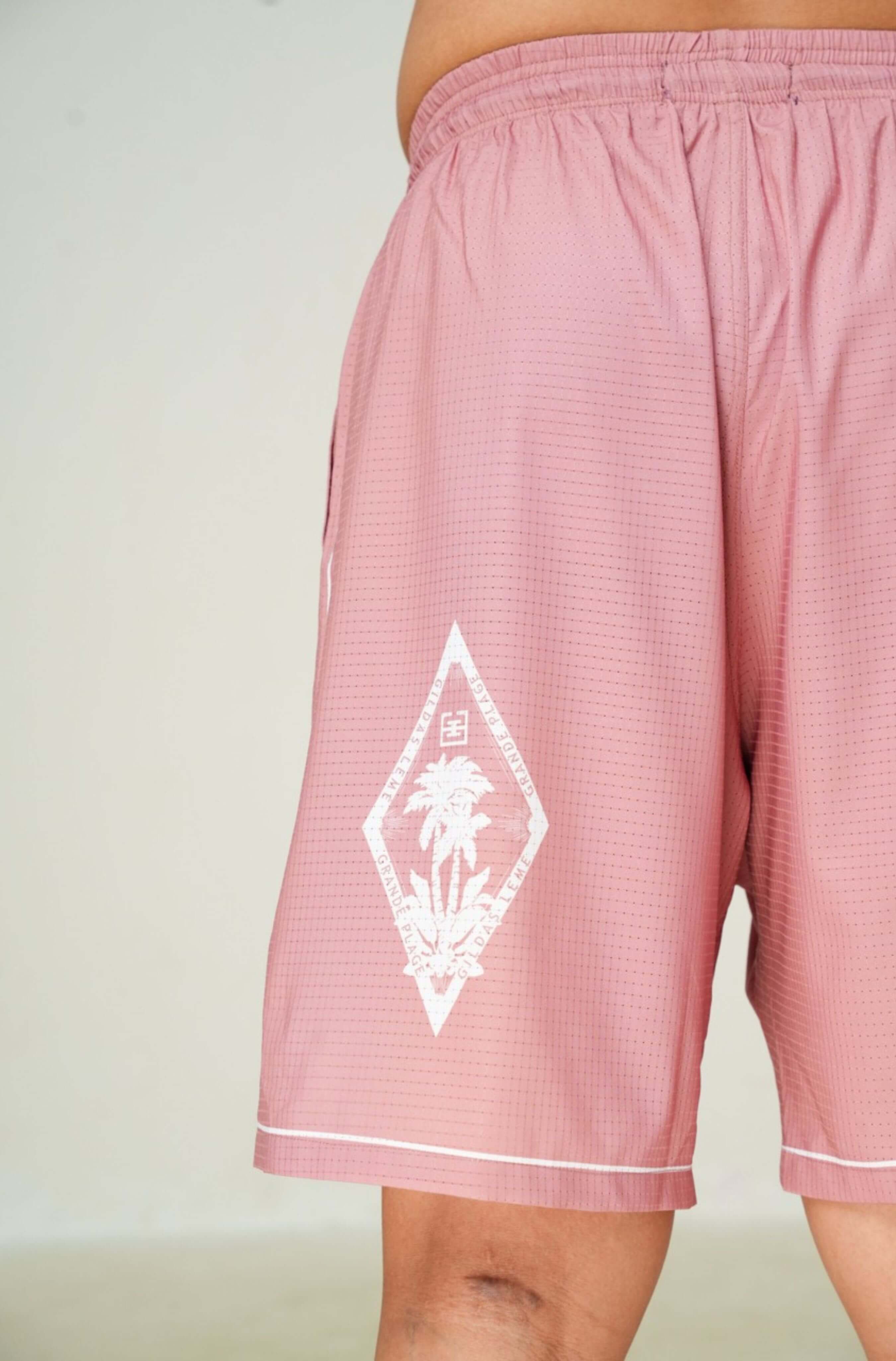 Real-life photo of Pink Paradise men’s summer resort shorts