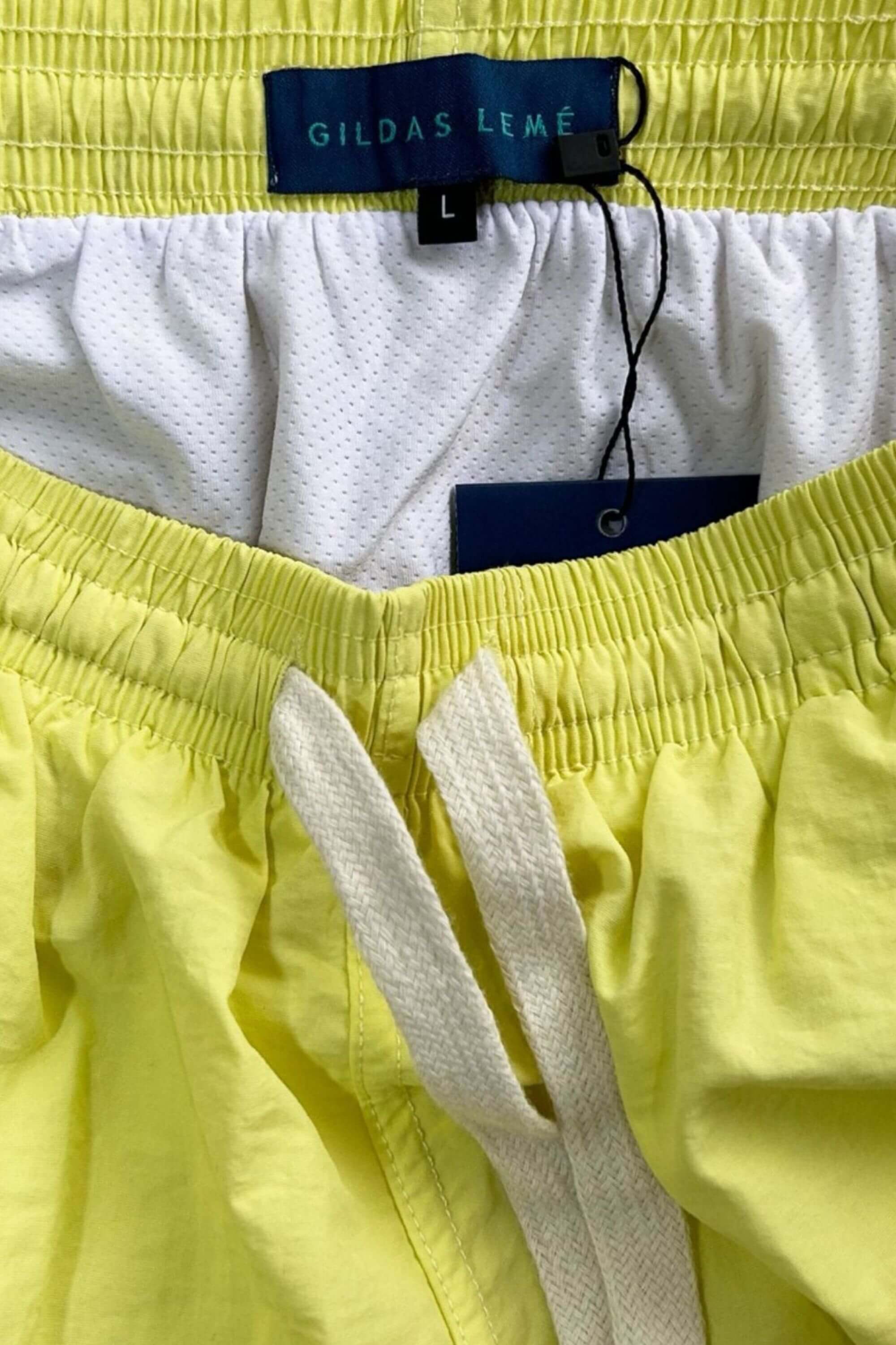 rhuys swim short front tag logo view #color_bright yellow