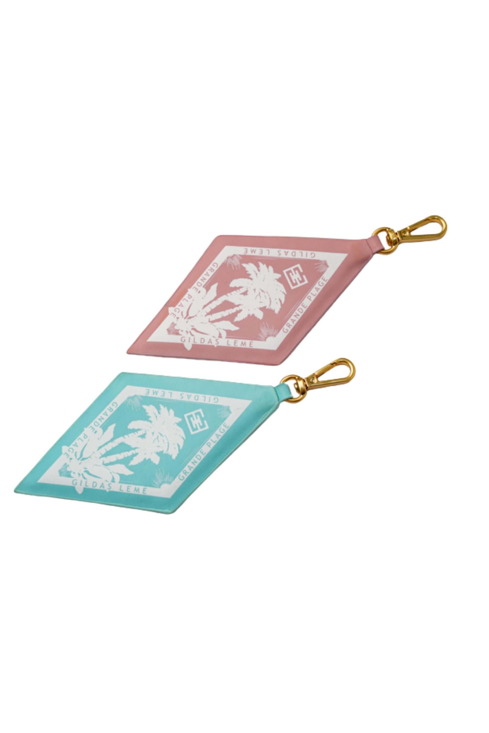 Two paradise edition bag charms - keychain and gold clasp - side View