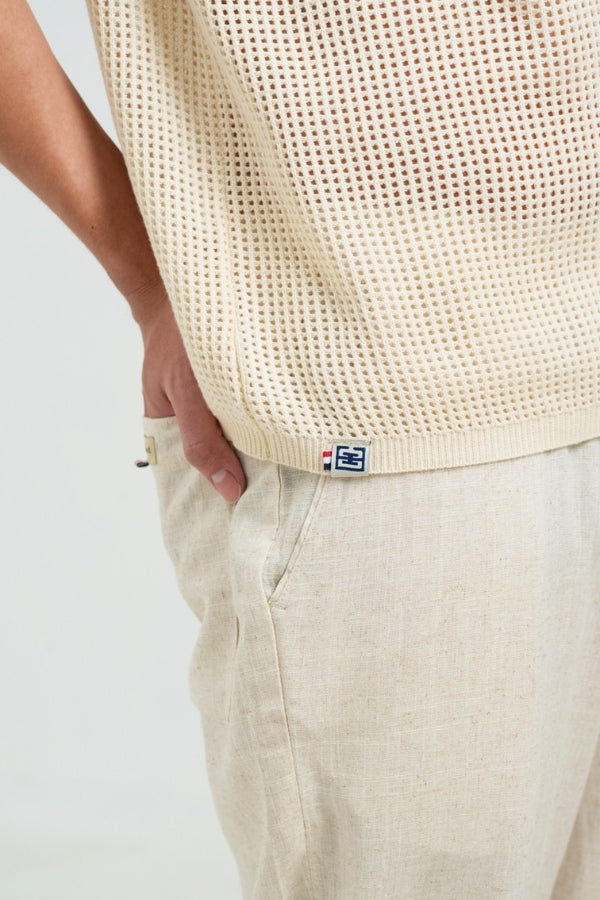 THE LOGO OF THE COAST KINT POLO SHIRT