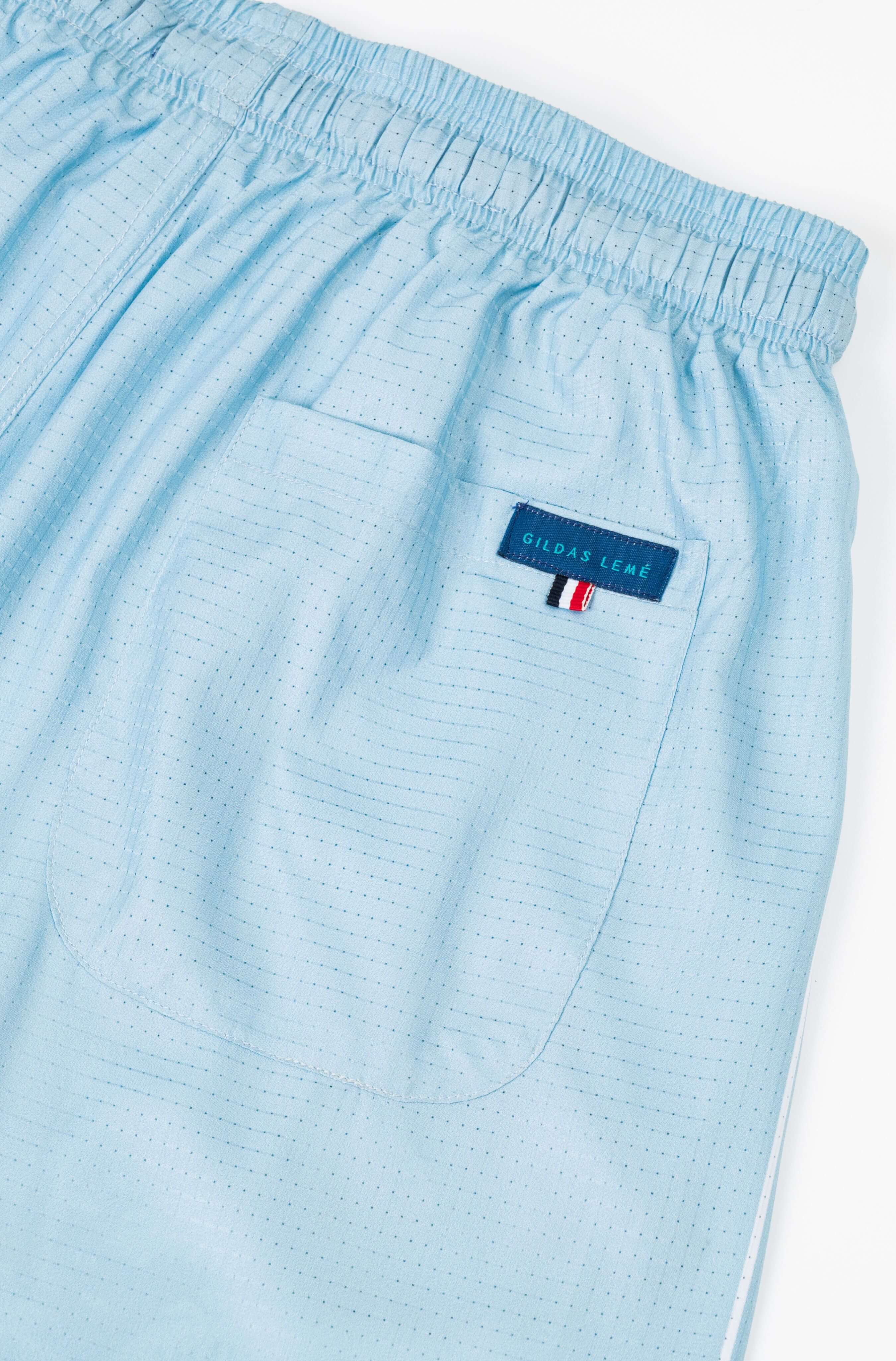 Back pocket of Pink Paradise men’s resort shorts
