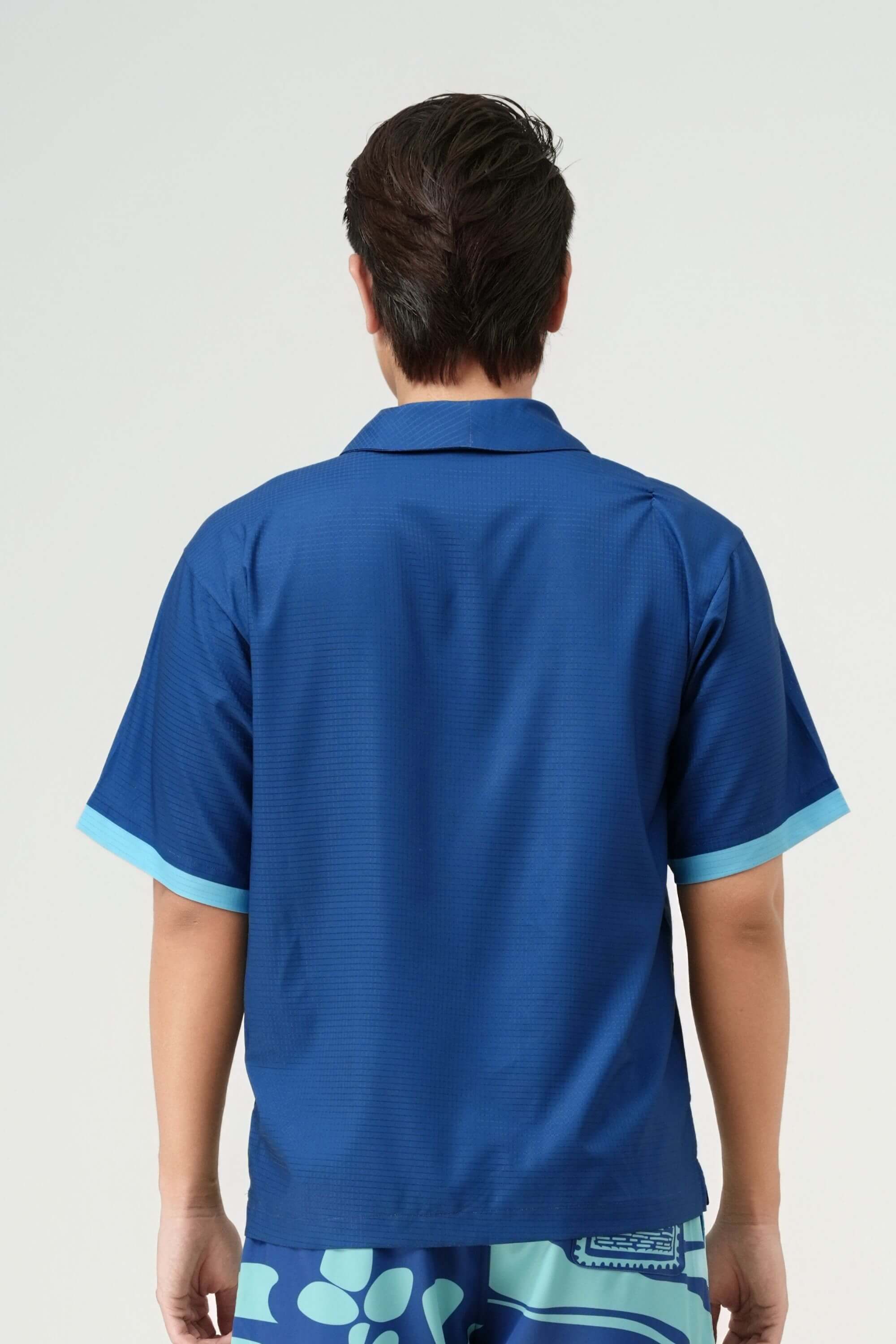 blue stamp resort shirt navy back view on model #color_navy