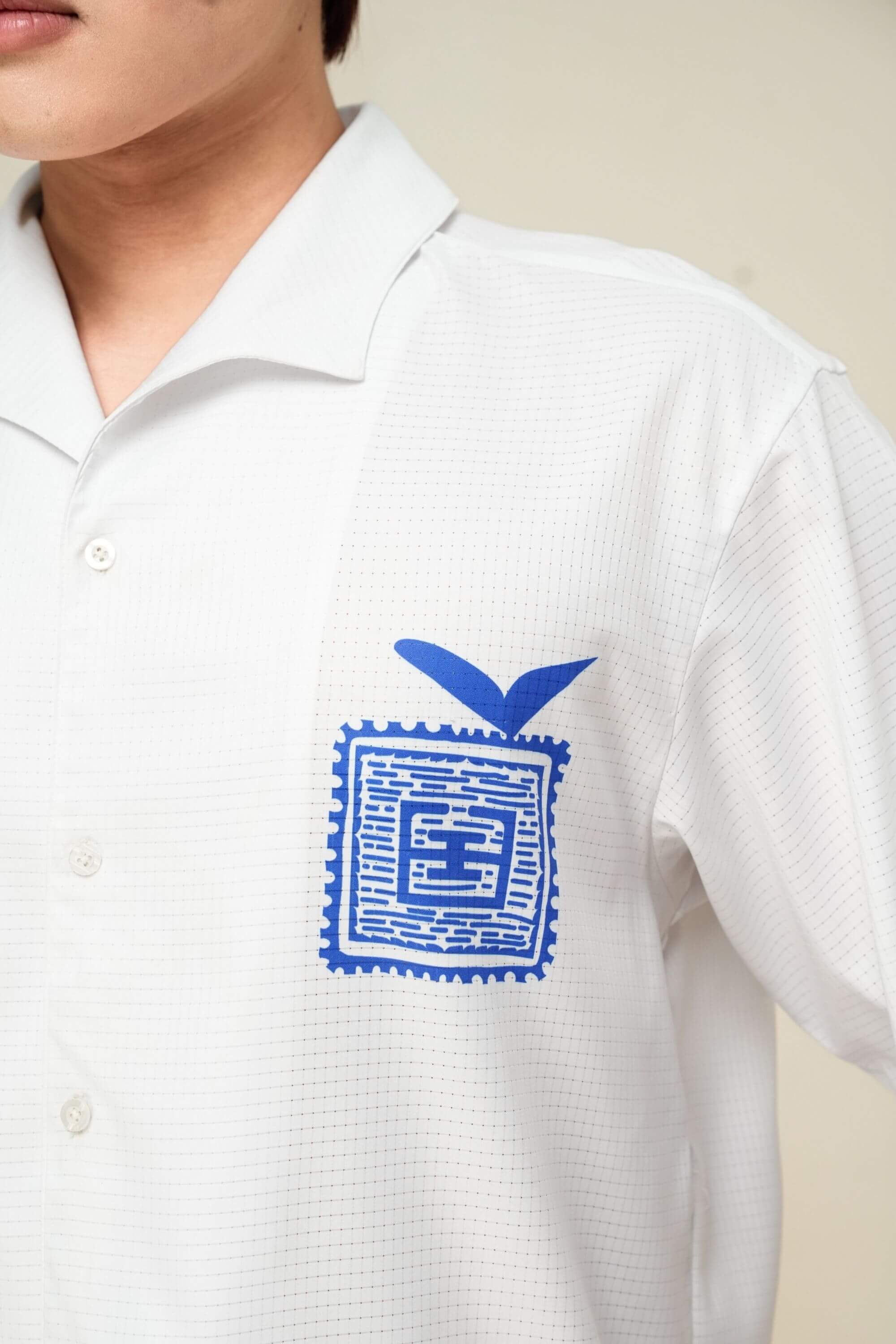 blue stamp resort short logo view on model #color_white