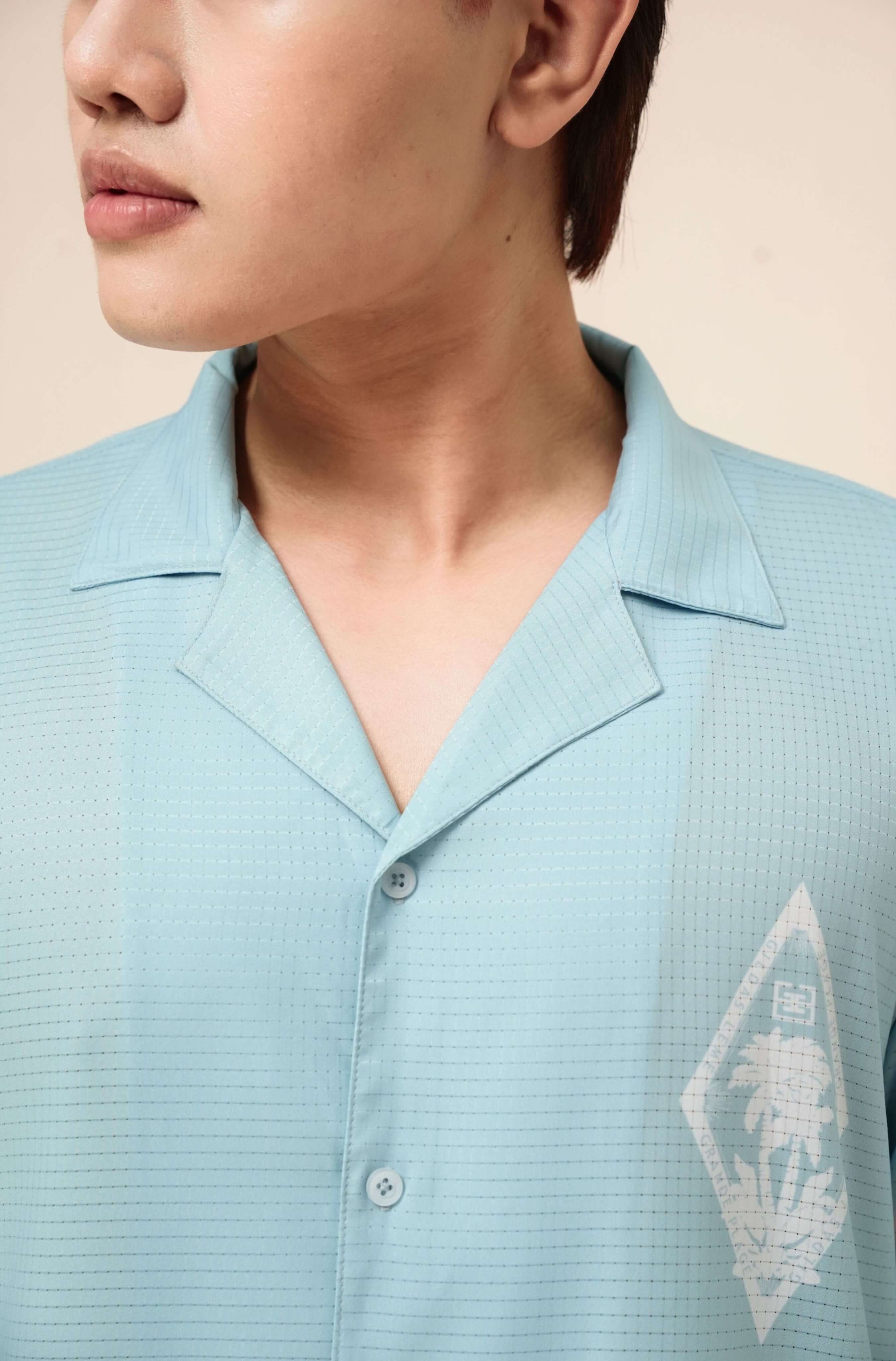 Real-life collar detail of men’s Pink Paradise resort shirt