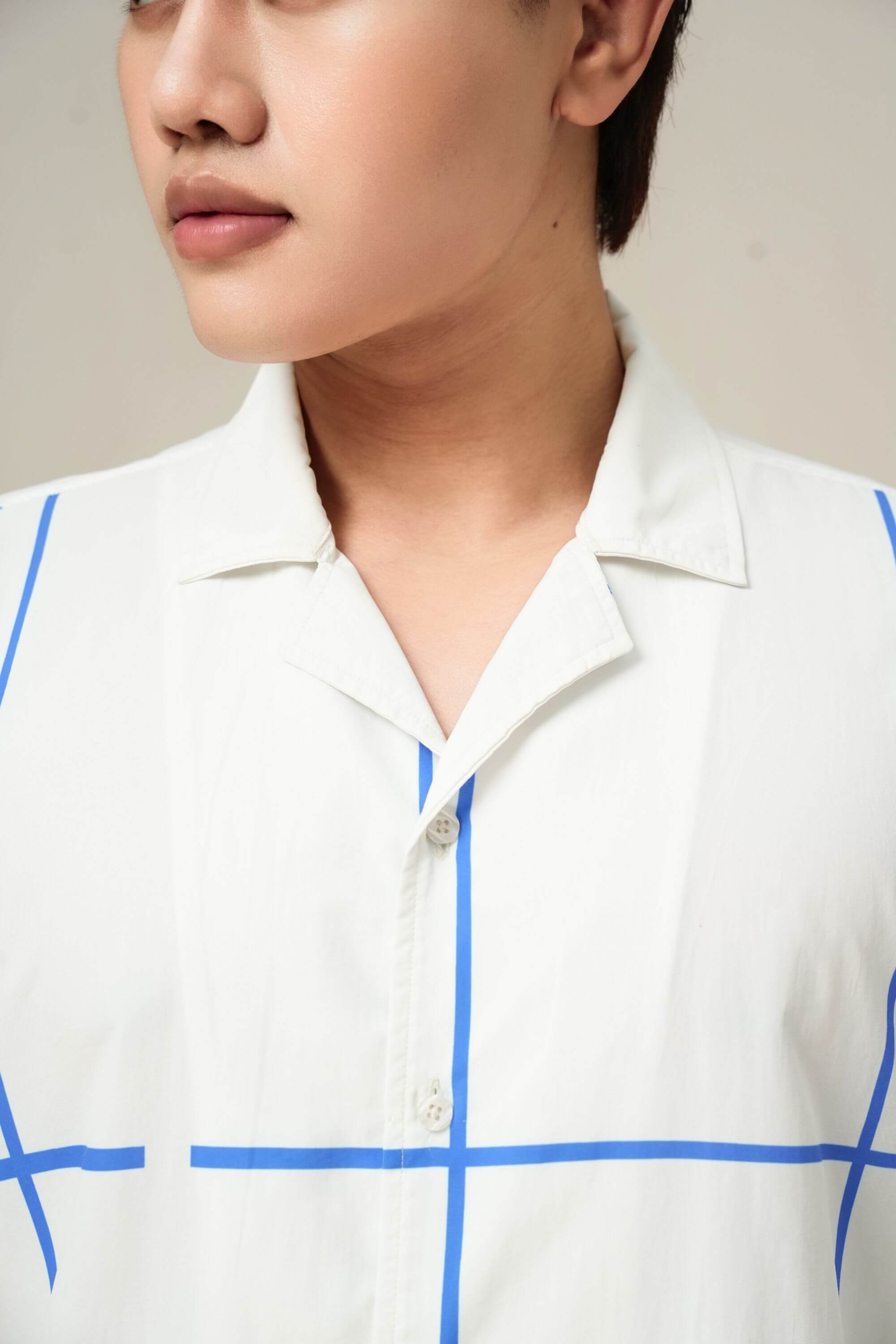 Midnight Bath Resort Set stripe detail - Blue geometric grid pattern