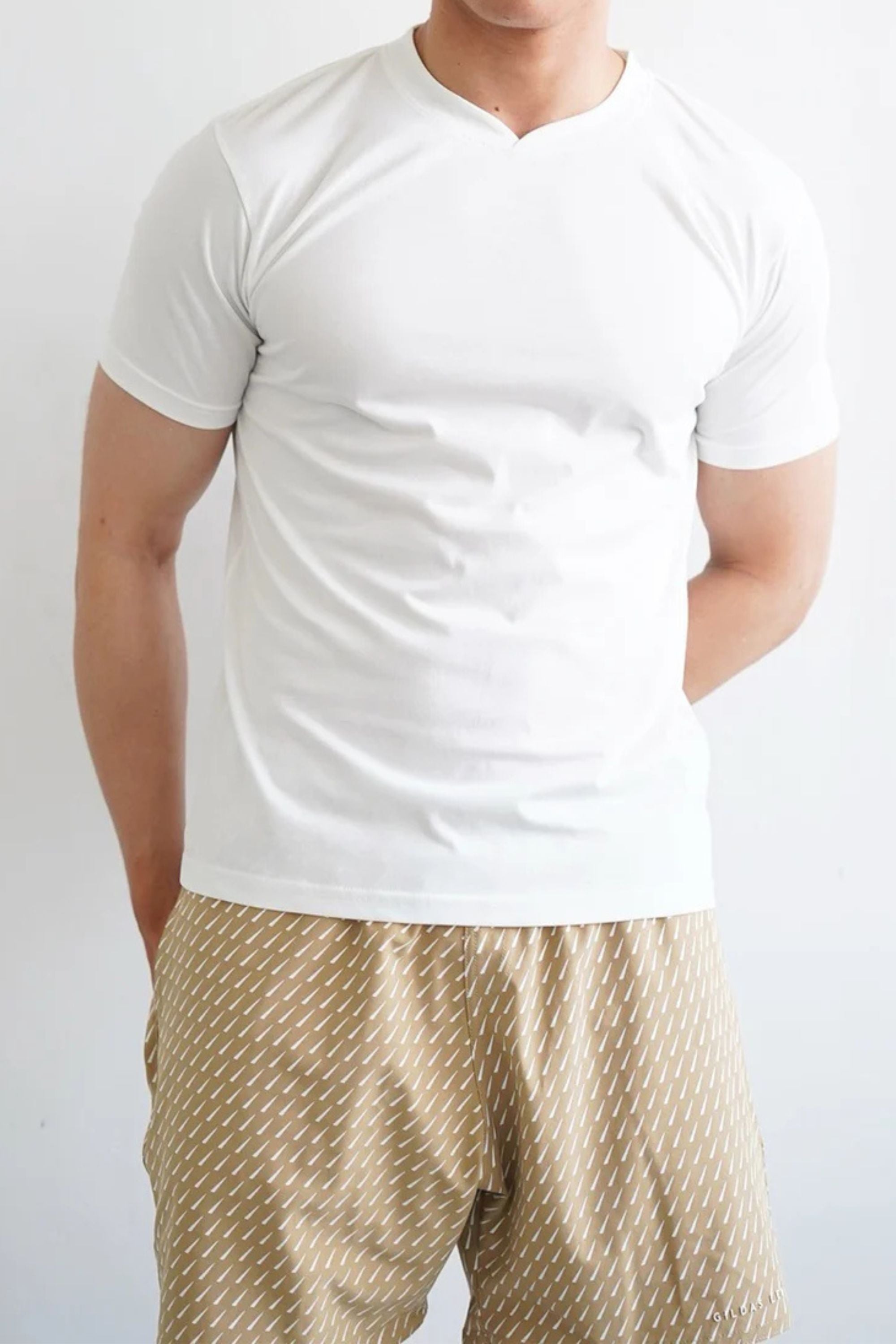accent swim short beige model wearing #color_beige