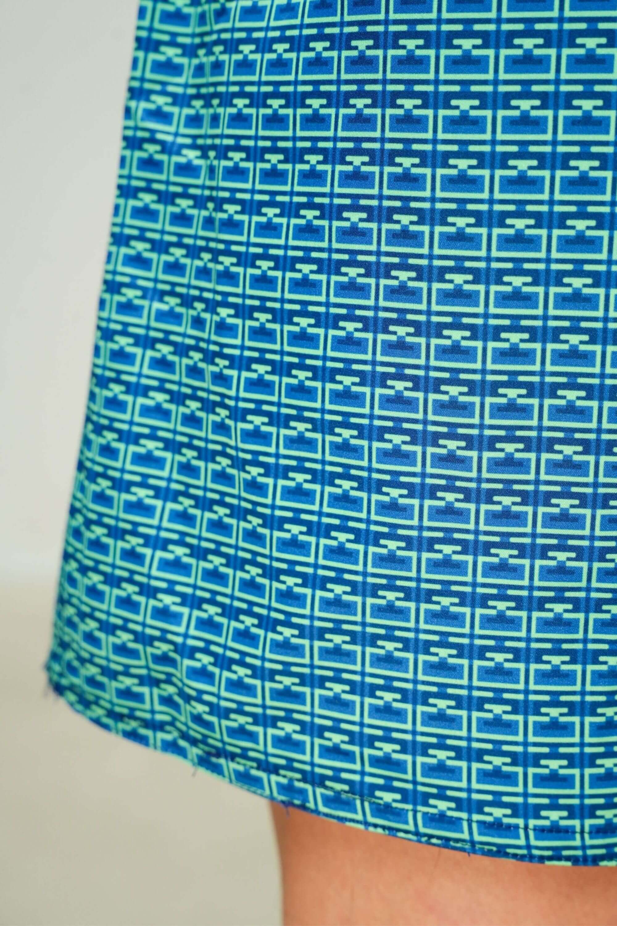 monogram edition swim trunk ocean green patterned view #color_ocean green