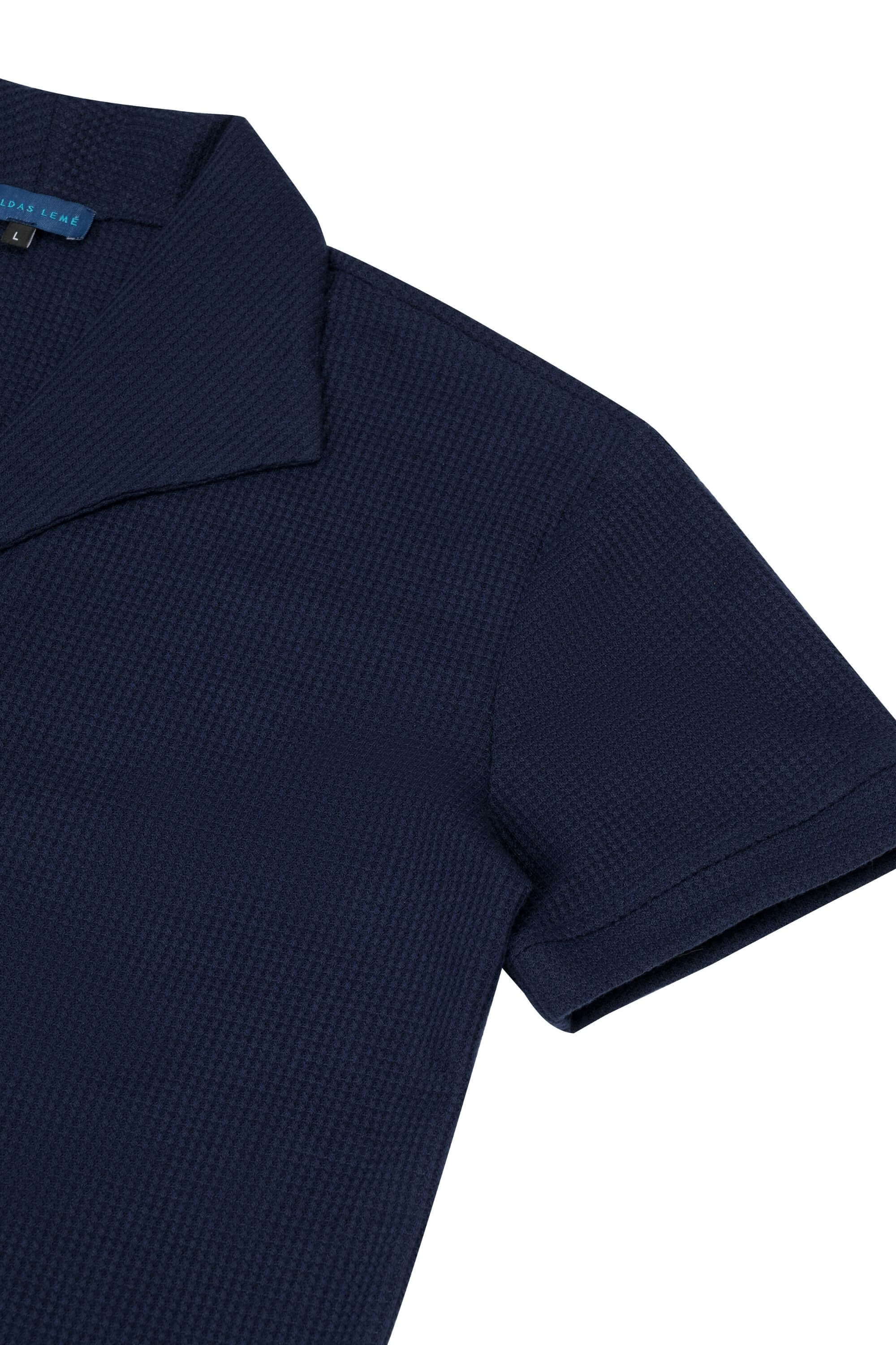 palma polo shirt navy sleeve view flatlay #color_navy